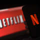 In this photo illustration a computer screen and mobile phone display the Netflix logo on March 31, 2020 in Arlington, Virginia.